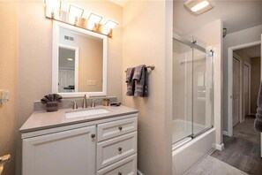 Shower, towels, soap, toilet paper