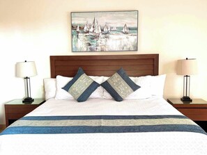 2 chambres, coffres-forts dans les chambres, fer et planche à repasser