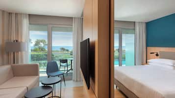 Junior Suite, 1 King Bed, Balcony, Sea View | Down comforters, minibar, in-room safe, blackout drapes