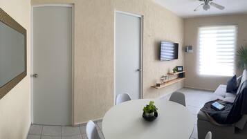 Comfort Apartment, Garden View | Living area