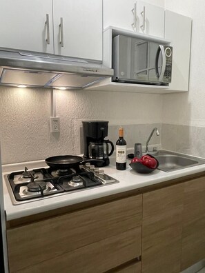 Căn hộ tiện nghi đơn giản, quang cảnh vườn | Bếp riêng