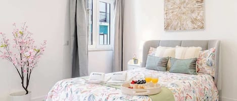 1 dormitorio, tabla de planchar con plancha, cuna de viaje y wifi gratis