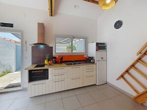 Fridge, microwave, oven, cookware/dishes/utensils