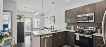 Modern 1BR near TPC Golf | Free Parking & Wifi