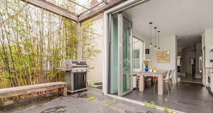 Spacious, artful 4-bedroom house in Brooklyn with lush backyard, parking, A/C