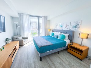 1 bedroom, desk, iron/ironing board, travel crib