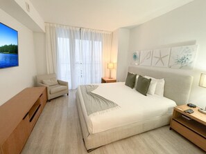 1 bedroom, desk, iron/ironing board, travel crib