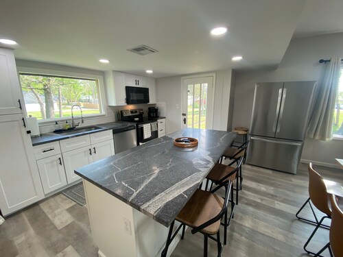 Monkey Island Escape sleeps 8, surrounded by nature with views of Grand Lake.