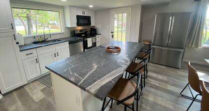 Monkey Island Escape sleeps 8, surrounded by nature with views of Grand Lake.