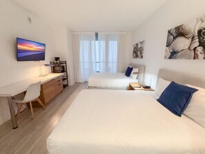 Desk, iron/ironing board, travel crib, WiFi