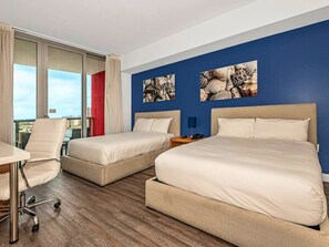 1 bedroom, desk, iron/ironing board, travel crib