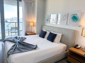 1 bedroom, desk, iron/ironing board, travel crib