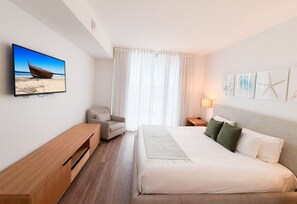 1 bedroom, desk, iron/ironing board, travel crib