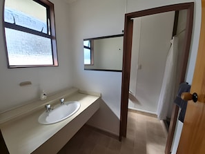 Shower, towels, soap, toilet paper