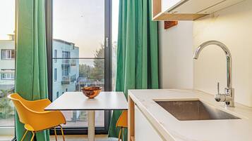 Apartment, 1 Bedroom, Sea View | Private kitchen | Full-size fridge, microwave