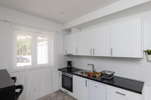 Leilighet | Eget kjøkken | Kjøleskap, ovn, kokeplater og kaffetrakter/tekoker