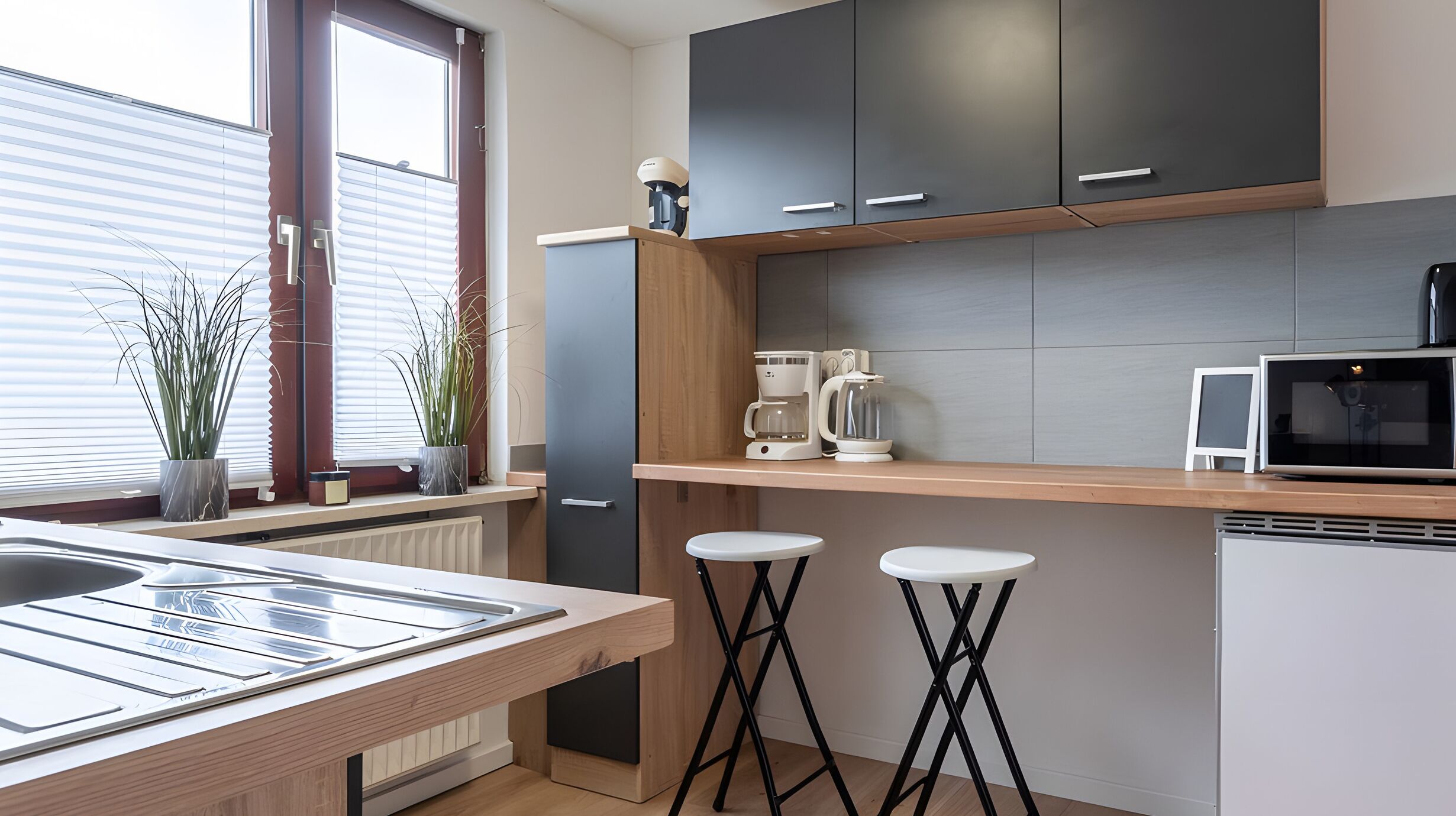 Fridge, microwave, stovetop, coffee/tea maker