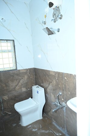 Shower, free toiletries, towels, soap