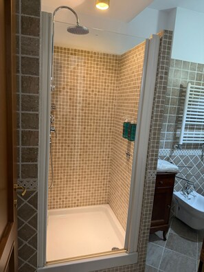 Shower, jetted bath, hair dryer, bidet