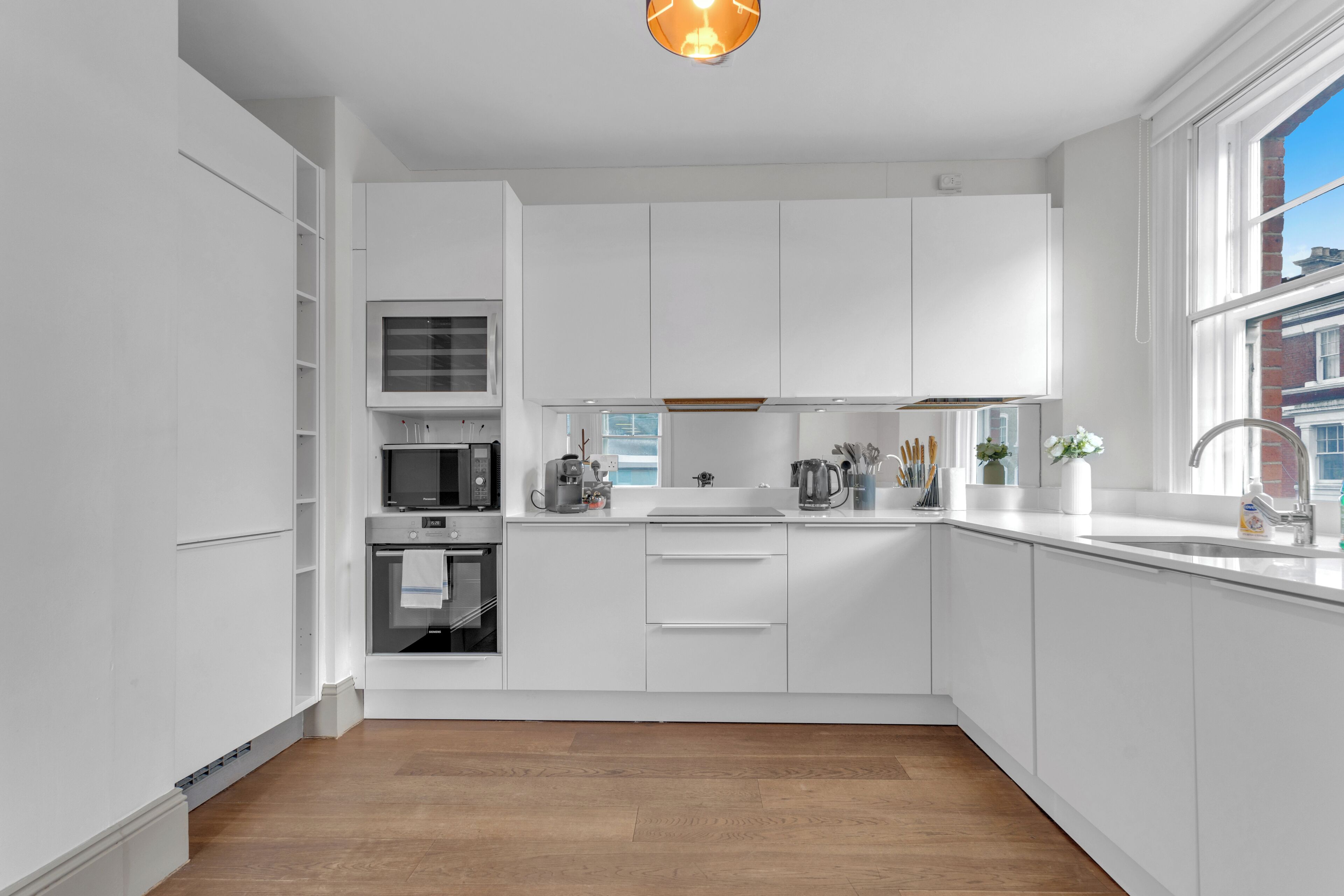 Coffee/tea maker, fridge, microwave, oven