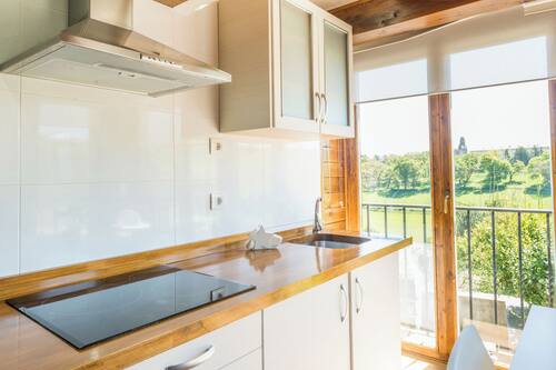 Family Apartment, 2 Bedrooms, Mountain View | Private kitchen | Microwave, stovetop, coffee/tea maker, cookware/dishes/utensils