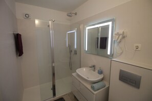 Hair dryer, towels, soap, toilet paper