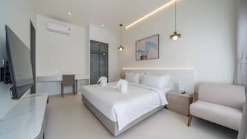 Desk, laptop workspace, blackout curtains, free WiFi