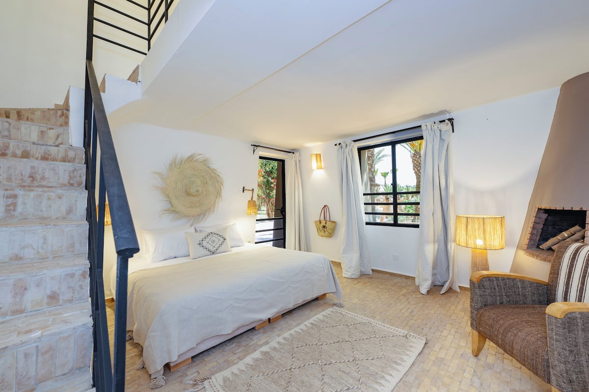 Habitación cuádruple familiar, vista al jardín | Caja de seguridad en la habitación y wifi gratis