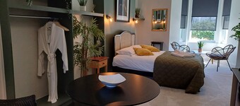 Luxurious Executive King Size Suite with  separate kitchenette and dining area.