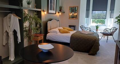 Luxurious Executive King Size Suite with separate kitchenette and dining area.