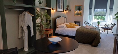 Luxurious Executive King Size Suite with  separate kitchenette and dining area.