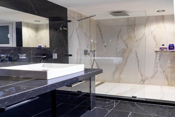 Hair dryer, towels, soap, toilet paper
