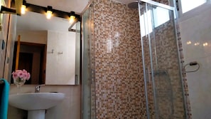 Hair dryer, bidet, towels, soap
