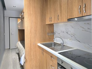 Fridge, microwave, toaster, cookware/dishes/utensils