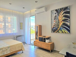 1 habitación, tabla de planchar con plancha, wifi gratis y ropa de cama 