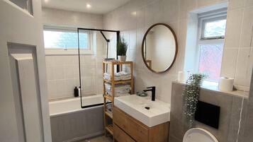 Bidet, towels, soap, toilet paper