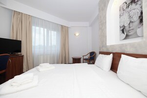 Minibar, desk, laptop workspace, blackout drapes