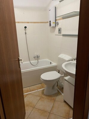 Hair dryer, towels, soap, toilet paper