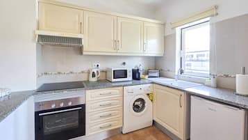 Fridge, coffee/tea maker, electric kettle, toaster