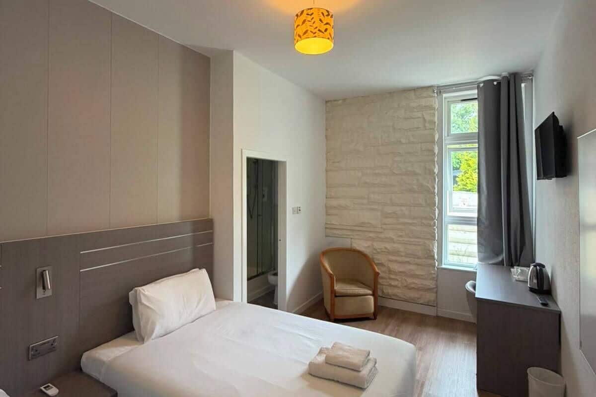 Habitación Deluxe con 2 camas individuales | 1 habitación, wifi gratis y ropa de cama