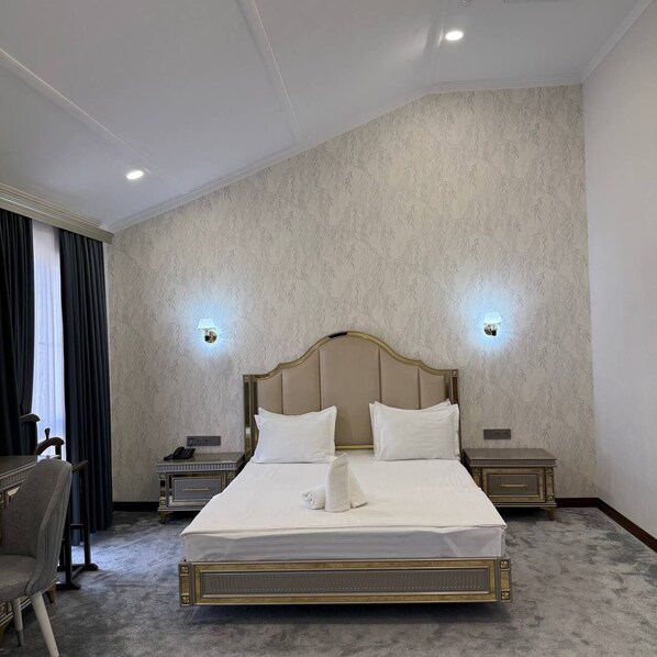 In-room safe, desk, laptop workspace, iron/ironing board