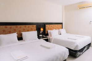 Quarto casal executivo, vista para a cidade | Área de estar