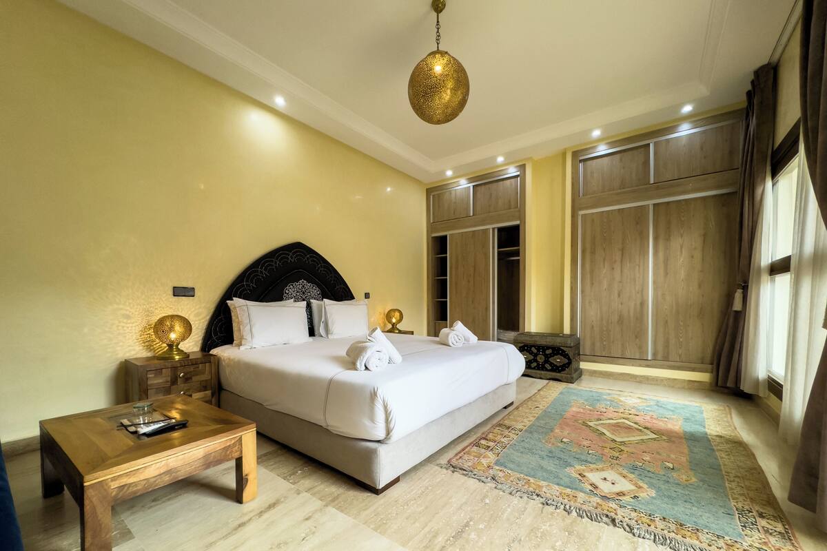 Superior Suite, Courtyard View | In-room safe, iron/ironing board, free WiFi