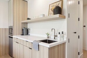 Fridge, microwave, coffee/tea maker, high chair