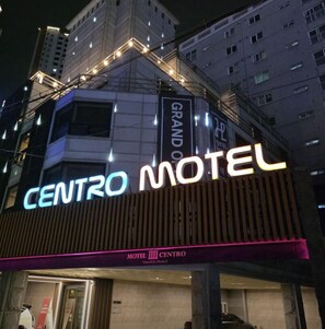 A building with a sign that reads "CENTRO MOTEL" and "GRAND HOTEL" indicating it is a hotel. - ANYANG IT CENTRO HOTEL (Anyang)