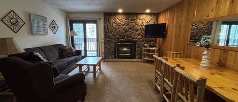 TV, fireplace, table football, books