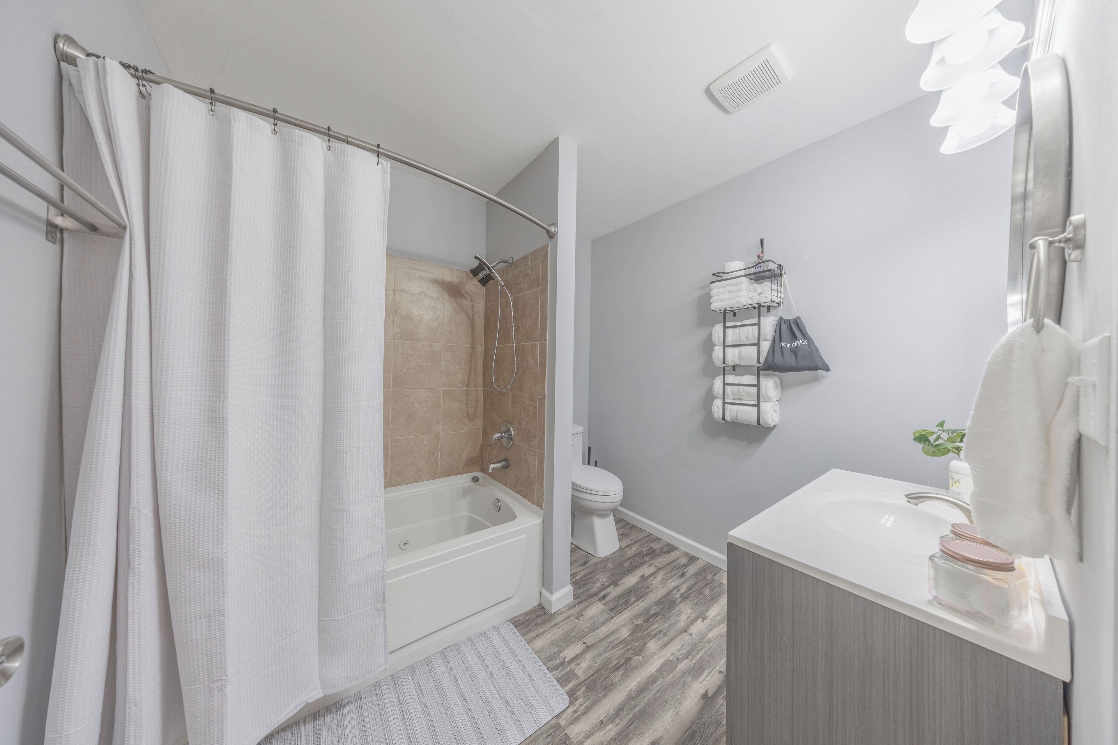 Jetted tub, hair dryer, towels, soap