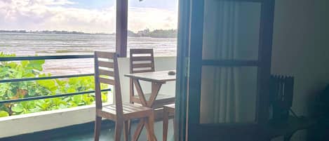 Triple Room, Balcony, Sea View | Individually decorated, individually furnished, desk, laptop workspace