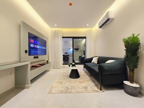 Luxury Apartment, Balcony | Living area - Hometel NRJS B Ruh (Riyadh)