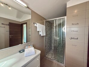 Shower, hair dryer, towels, soap